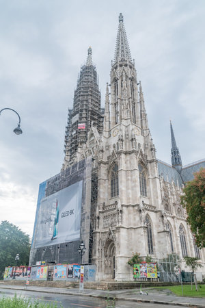 Vienna, Austria - August 30, 2020: Votivkirche, Votive neo-Gothic style church.のeditorial素材