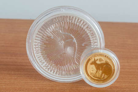 Australian Kangaroo silver and gold coins. 1oz silver coin and quarter oz gold coin.の写真素材