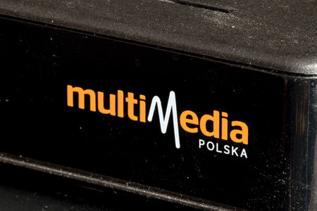 Pruszcz Gdanski, Poland - January 25, 2021: Multimedia Polska logo on TV cable decoder. Multimedia is broadband cable operator.のeditorial素材