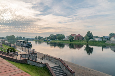 Gorzow Wielkopolski, Poland - June 1, 2021: Warta river and Warta boulevards at sunrise.のeditorial素材