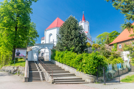 Bogatynia, Poland - June 2, 2021: Entrance stairs to Saints Peter and Paul Church.