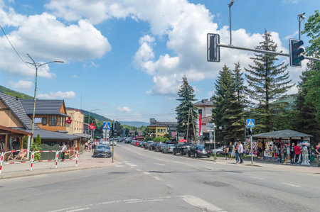 Szczyrk, Poland - June 6, 2021: View on main street in Szczyrk, Beskidzka street at summer time.のeditorial素材