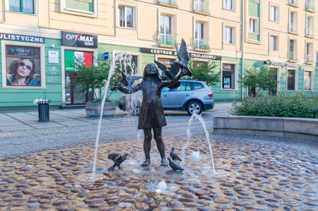 Czestochowa, Poland - June 6, 2021: Fountain Little girl with pigeons.のeditorial素材