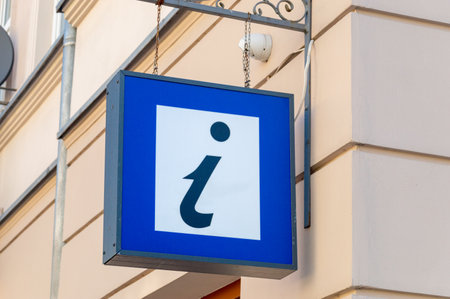 The Info sign and logo on the tourist information office.の写真素材