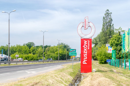 Pruszkow, Poland - June 15, 2021: Entrance sign to Pruszkow city and sign of the end of Reguly village.のeditorial素材