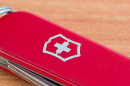 Pruszcz Gdanski, Poland - July 17, 2021: of Victorinox on red Swiss Army knife Victorinox.のeditorial素材