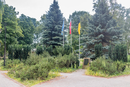Hel, Poland - July 20, 2021: Hel city, Polish and Kashubian flag and monument commemorating Kashubian Jan Mylisz who fought for Polish independence.のeditorial素材