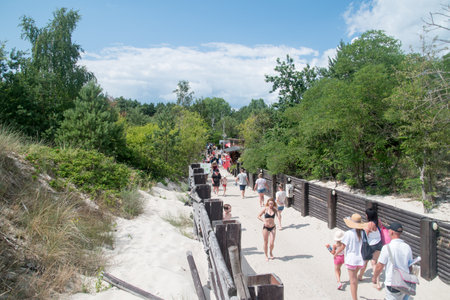 Hel, Poland - July 20, 2021: Entrance to beach on Hel Peninsula of the Baltic Sea at summer time.のeditorial素材