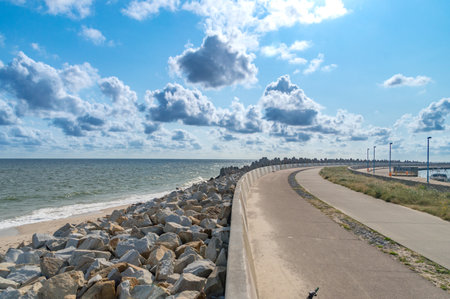 Wladyslawowo, Poland - July 21, 2021: Concrete breakwater protecting the port from storm. Concrete shaft protecting entrance to the harbour.のeditorial素材