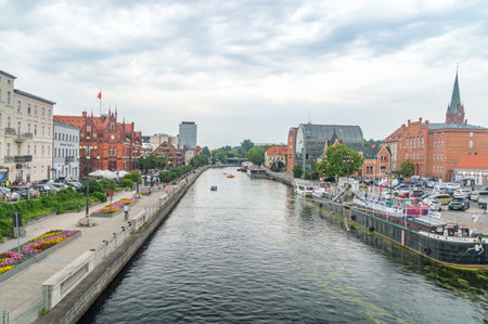 Bydgoszcz, Poland - July 25, 2021: Brda River in old town of Bydgoszcz at cloudy day.
