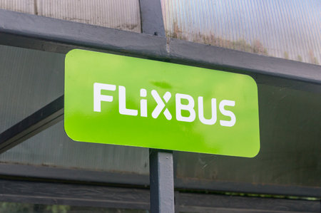 Malbork, Poland - July 26, 2021: Logo of Flixbus on bus stop. Flixbus is a brand which offers intercity bus service all over Europe.のeditorial素材