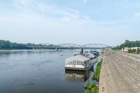 Torun, Poland - July 26, 2021:Philadelphia Boulevard on Vistula river in Torun.