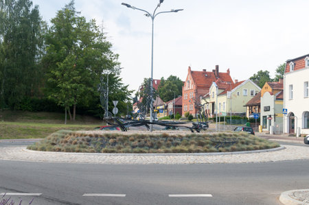 Sztum, Poland - July 26, 2021: The roundabout with sculptures of athletes.のeditorial素材