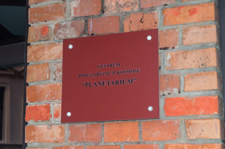 Torun, Poland - July 26, 2021: Plate with the inscription Space popularization center - PLANETARIUM on Planetarium Wladyslaw Dziewulski in Torun.のeditorial素材