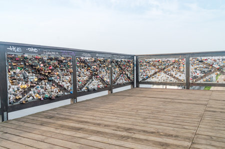 Torun, Poland - July 26, 2021: Padlock of lovers at former bridge over the Vistula River.