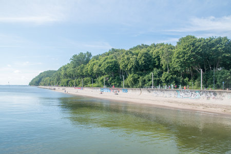 Gdynia, Poland - August 1, 2021: Seashore view with breakwaker on Baltic sea in Gdynia.のeditorial素材