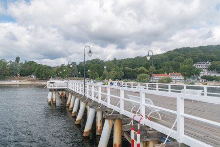 Gdynia, Poland - August 1, 2021: Wooden pier on Baltic Sea in Gdynia Orlowo at summer time.のeditorial素材