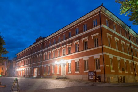 Turku, Finland - August 5, 2021: Katedralskolan (Cathedral School of Abo) at the Old Great Square at night.のeditorial素材