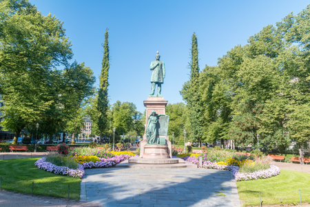 Helsinki, Finland - August 5, 2021: Statue of Johan Ludvig Runeberg, the national poet of Finland, at Esplanadi park avenue.のeditorial素材
