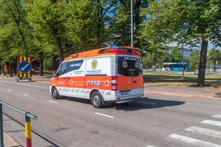 Helsinki, Finland - August 5, 2021: Ambulance on road. Helsinki rescue service.