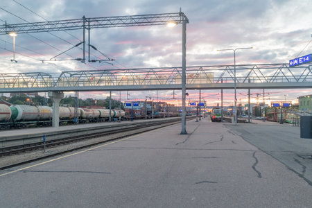 Turku, Finland - August 5, 2021: Sunrise on platform on Turku Abo railway station.のeditorial素材