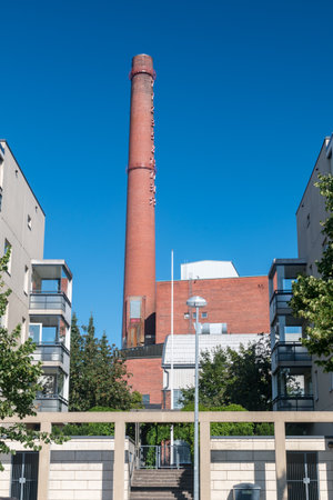 Turku, Finland - August 6, 2021: View with chimney of Turku Energia old power plant.のeditorial素材