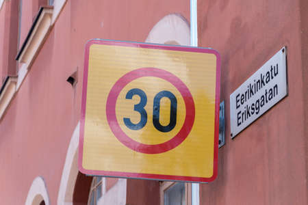 Sign 30 km per hour speed limit zone traffic in Finland.の写真素材