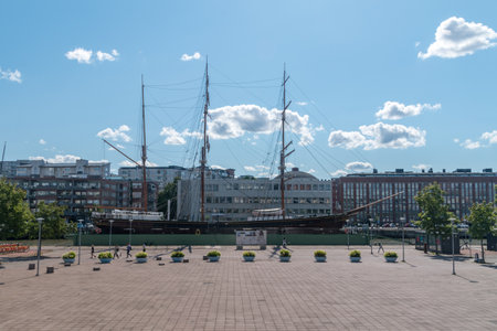 Turku, Finland - August 6, 2021: Sigyn ship in the Aura River in Turku. Sigyn, built in Gothenburg 1887, now museum ship in Turku, is the last remaining wooden barque used for trade across the oceans.のeditorial素材