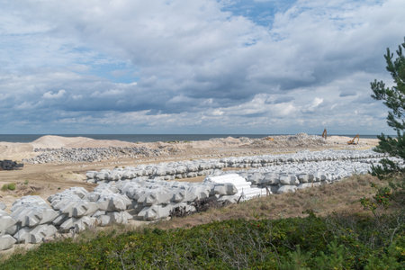 Skowronki, Poland - August 17, 2021: View on Baltic Sea beach during construction Vistula Spit canal.のeditorial素材