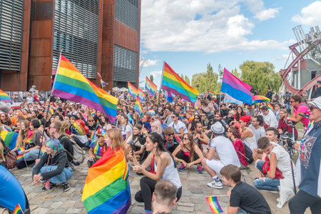 Gdansk, Poland - August 21, 2021: Pride LGBT march. Guys, girls, queers and gender diversity with rainbow flags at gay pride parade.のeditorial素材
