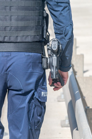 Gdansk, Poland - August 21, 2021: Beretta pistol in a policeman's holster.のeditorial素材
