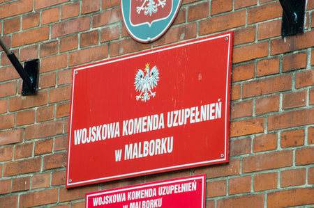 Malbork, Poland - August 26, 2021: Text of Wojskowa Komenda Uzupelnien (WKU, translated variously as Army Recruiting Command or Military Replenishment Council).のeditorial素材