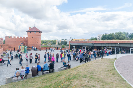 Malbork, Poland - August 26, 2021: Square with tourist near ticket office of Malbork castle.のeditorial素材