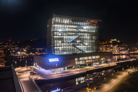 Oslo, Norway - September 23, 2021: Construction site of the current Munch Museum at Bjorvika at night.のeditorial素材