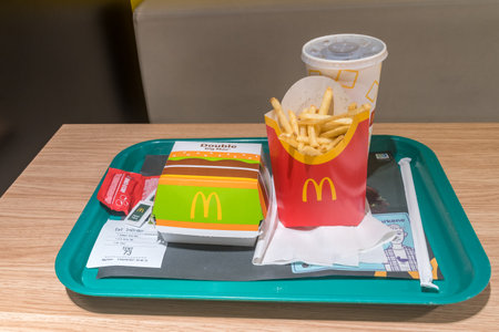 Oslo, Norway - September 24, 2021: McDonald menu with Double Big Mac sandwich, french fries and...