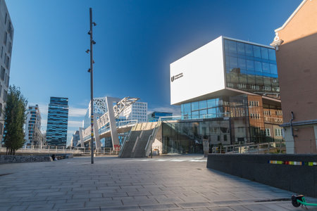Oslo, Norway - September 25, 2021: Akrobaten footbridge over the track area at Oslo Central Station at sunny day.のeditorial素材