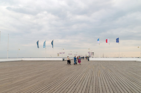 Sopot, Poland - October 6, 2021: Longest wooden pier in Poland at cloudy day.のeditorial素材
