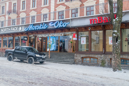 Zakopane, Poland - December 29, 2021: Tourist information point at Krupowki street in winter.のeditorial素材