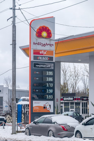 Kutaisi, Georgia - March 18, 2022: Price board on Rompetrol gas station. Rompetrol is of KMG International of Romanian origin.のeditorial素材