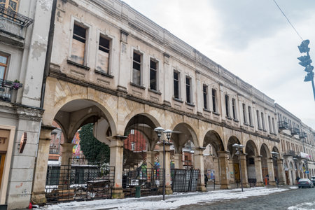 Kutaisi, Georgia - March 19, 2022: Ruined building with arch in city center of Kutaisi.