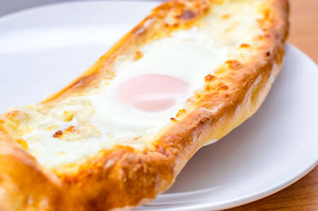 Detail of Georgian khachapuri. Khachapuri is a traditional Georgian dish.