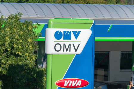 Bratislava, Slovakia - May 31, 2022: Logo of OMV on gas station. OMV (English: Austrian Mineral Oil Administration Stock Company).のeditorial素材