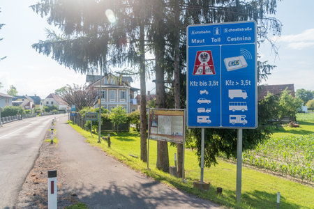 Mureck, Austria - June 1, 2022: Entrance road to Austria with board information about toll.のeditorial素材