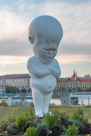 Bratislava, Slovakia - May 31, 2022: Big and white Niemand (Picus) sculpture on Danube river.のeditorial素材