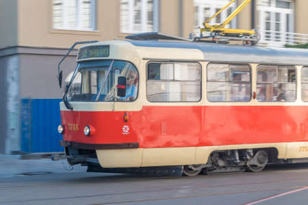 Bratislava, Slovakia - May 31, 2022: Retro red and white tram on the street of Bratislava.のeditorial素材