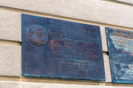Zagreb, Croatia - June 2, 2022: Memorial plaque to the Croatian state printing house in Zagreb.のeditorial素材