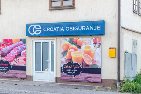 Hrvatska Dubica, Croatia - June 2, 2022: Croatia osiguranje in Hrvatska Dubica. Croatia Insurance is an insurance company.のeditorial素材
