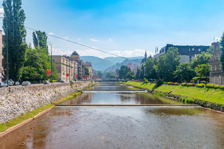 Sarajevo, Bosnia and Herzegovina - June 3, 2022: Sarajevo with Miljacka river in the summer.のeditorial素材