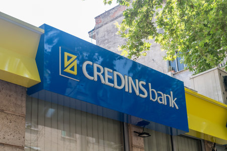 Tirana, Albania - June 4, 2022: Logo and sign of Credins bank.