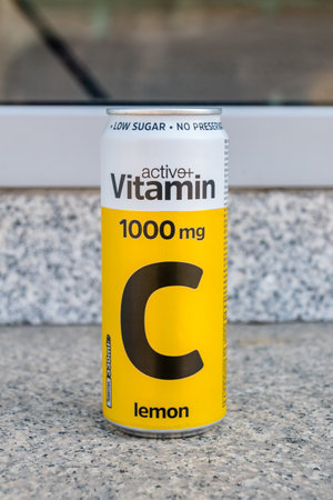 Pristina, Kosovo - June 5, 2022: Can of Active plus Vitamin C drink. Lemon taste drink.のeditorial素材